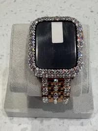Luxury Watch Screen Case with Preciosa® Crystals on a beige display, featuring a crystal-encrusted bezel and band.