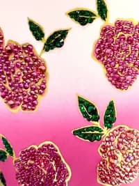 Sparkling Crystal Flower Mug showing close-up of intricate pink crystal flowers with green crystal leaves on a pink gradient background.