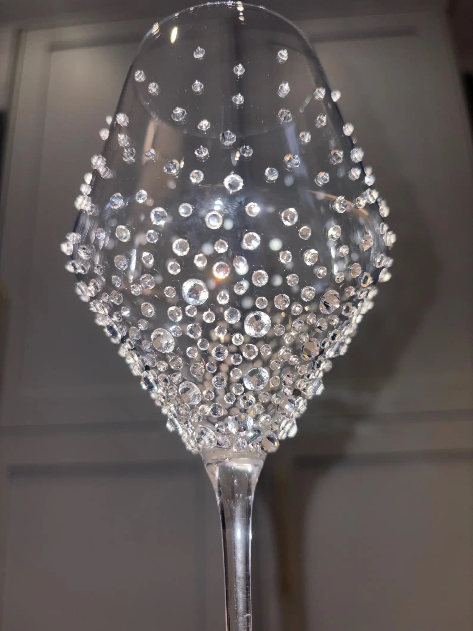 Luxury Crystal White Wine Glass with sparkling crystals in a graduated pattern, focusing on the elegant decorative design.