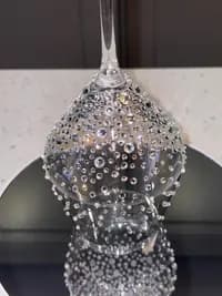 Luxury Crystal White Wine Glass with sparkling crystals, shown upside down highlighting the intricate graduated design detail.